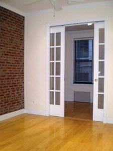 209 E 25th St - Photo 3 of 8