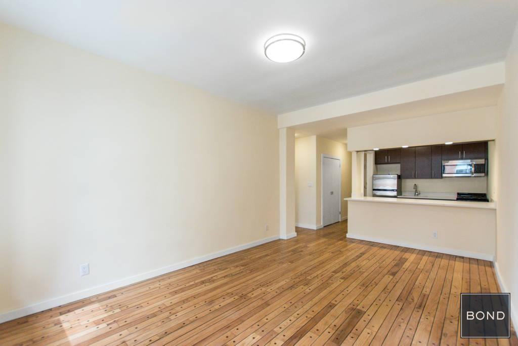 421 E 14th St - Photo 2 of 3