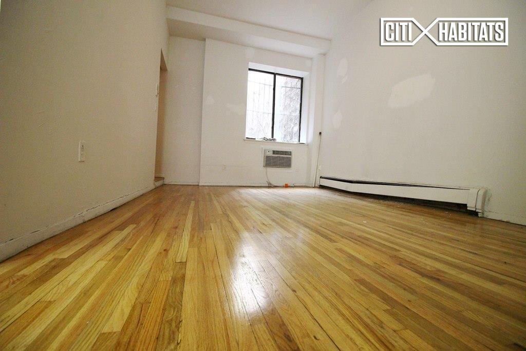 E 25th St #1A