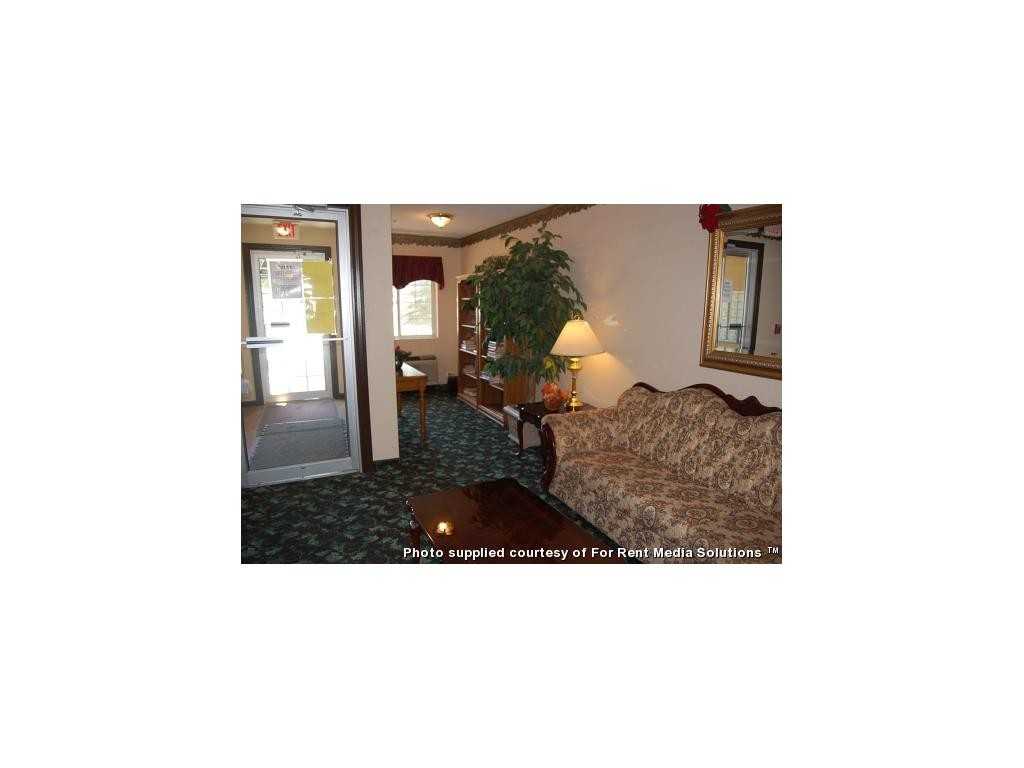 Sunset Village Apartments - Photo 2 of 18