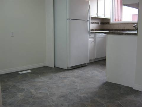 10674 Beaumaris Rd NW - Photo 2 of 3