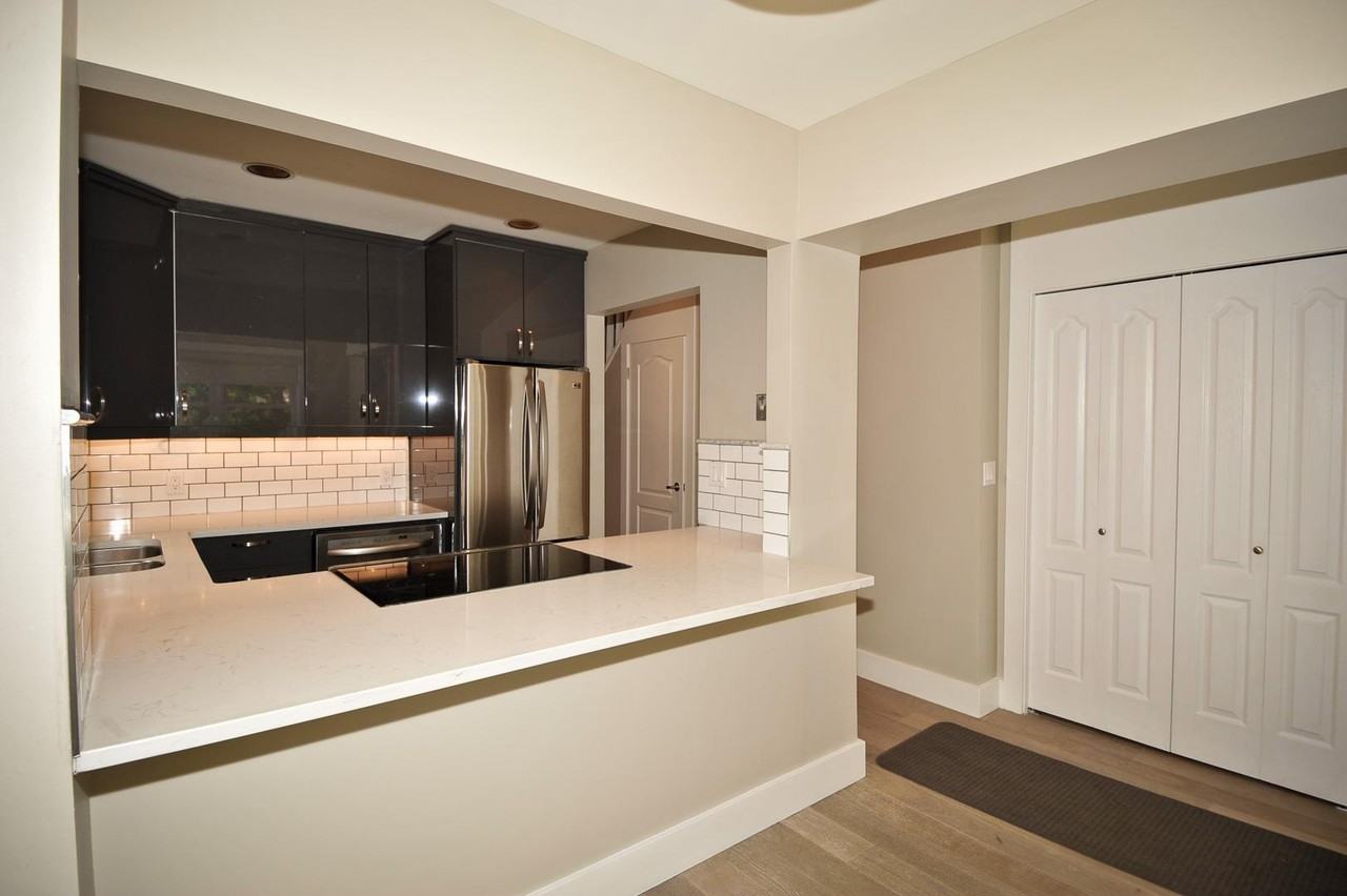 1625 15th Ave SW #103 - Photo 2 of 18