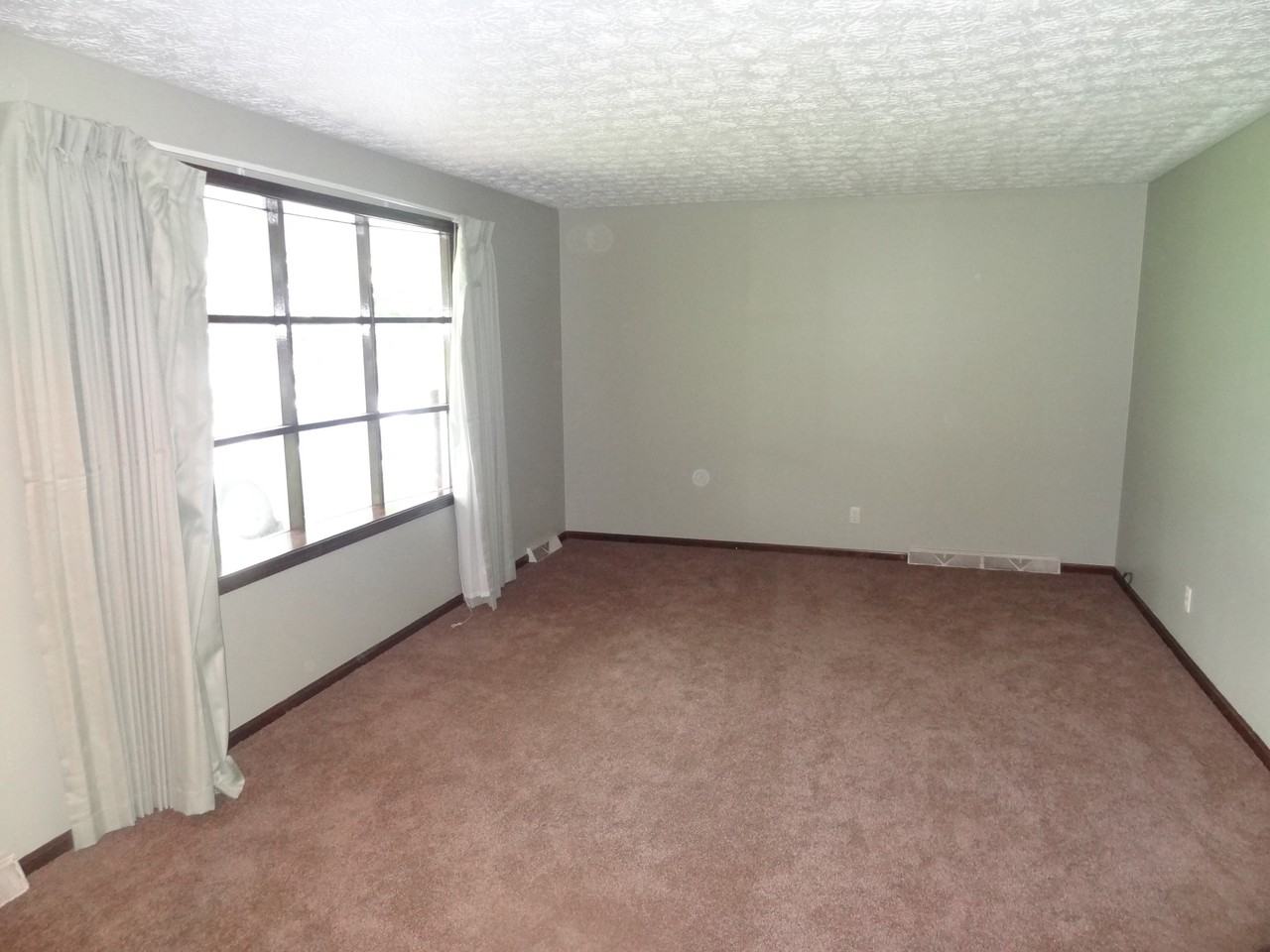 11024 Sagebrush Ave NE - Photo 3 of 10