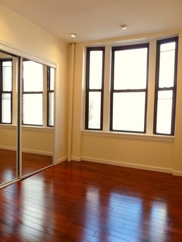 142 E 22nd St - Photo 2 of 4