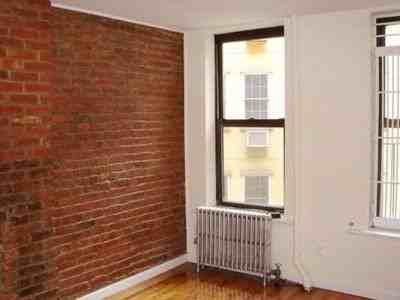 411 E 12th St - Photo 3 of 4