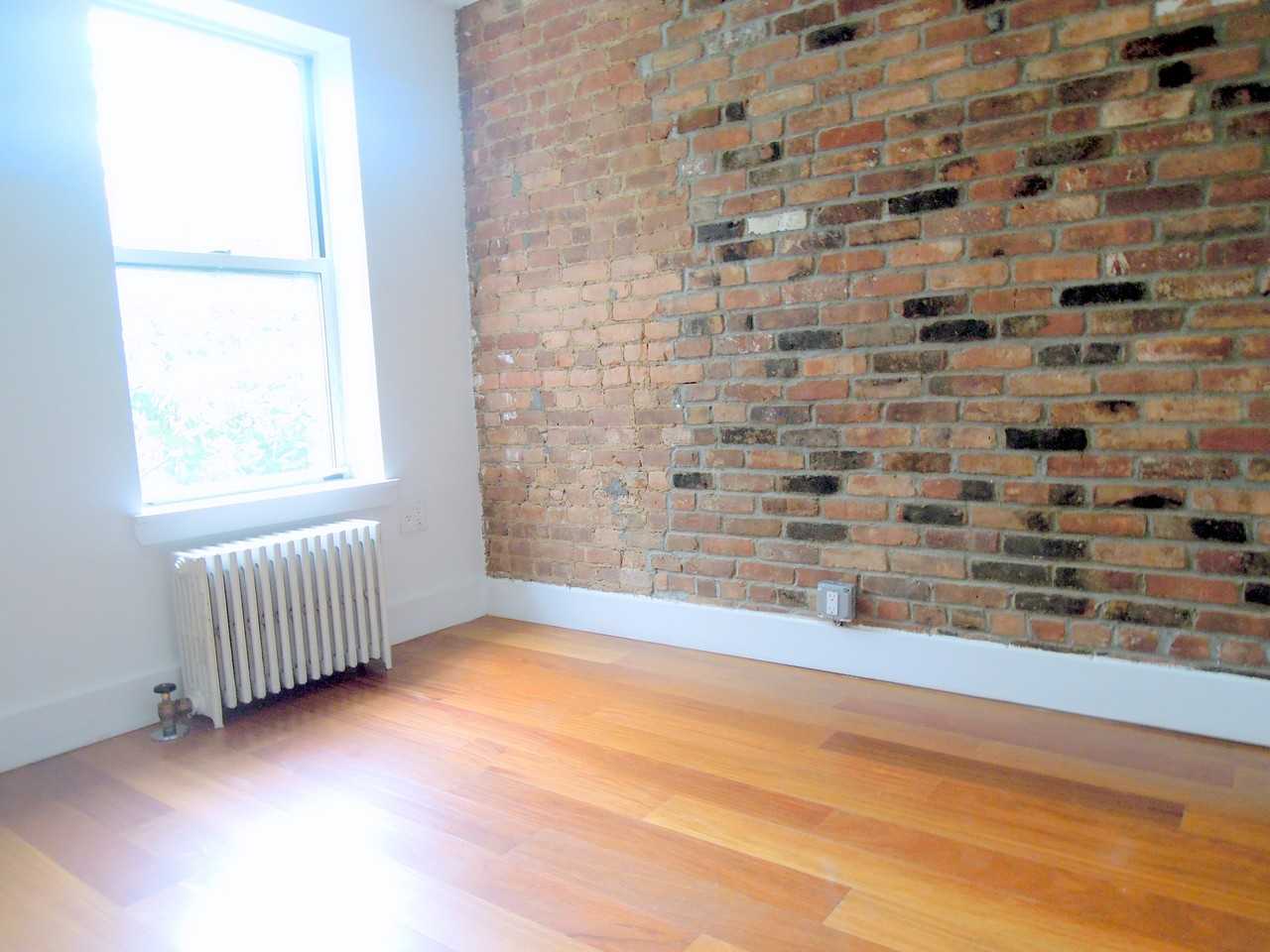 203 E 4th St - Photo 2 of 7