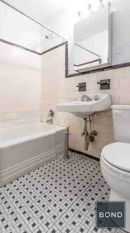 100 Bleecker St - Photo 3 of 3