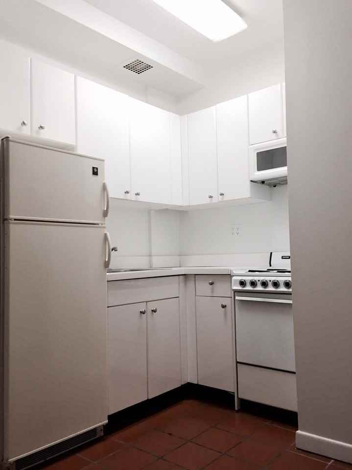 229 W 58th St - Photo 2 of 3