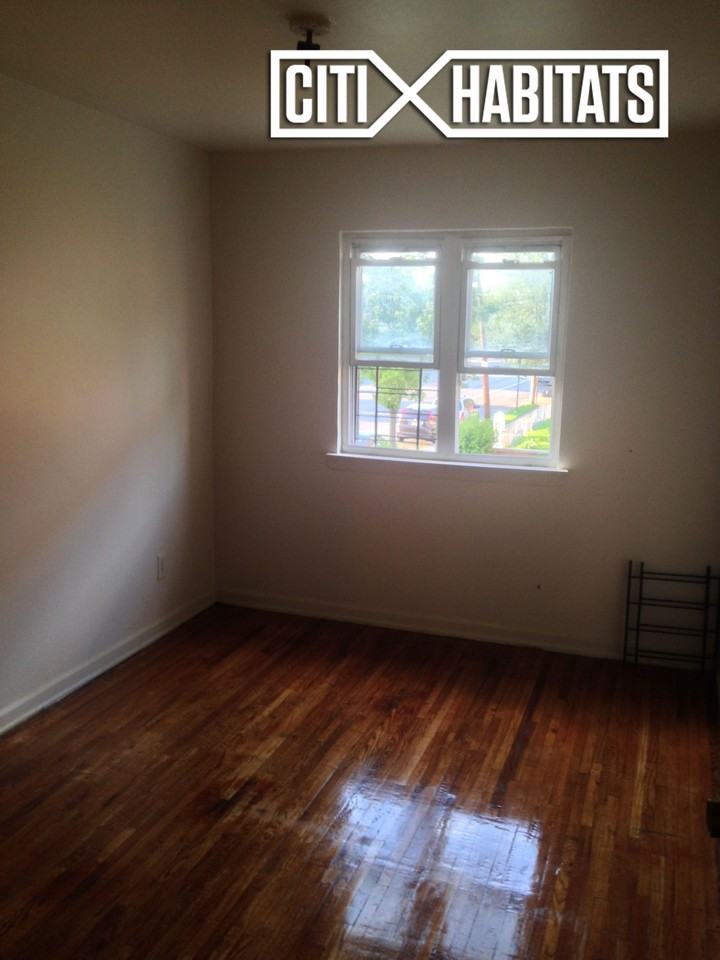 1101 E 222nd St #1 - Photo 3 of 6