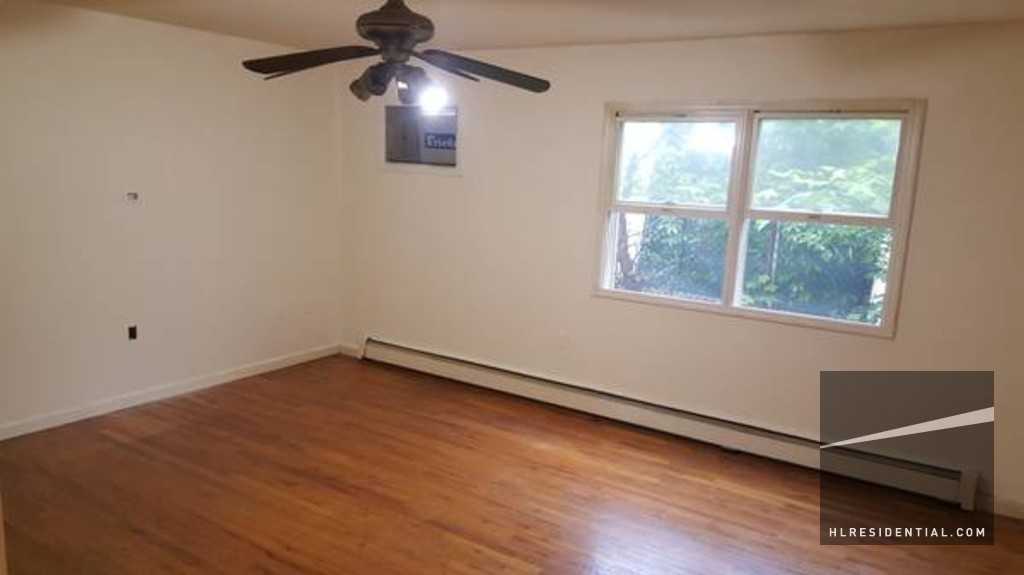 69-53 75th St 1 - Photo 3 of 7