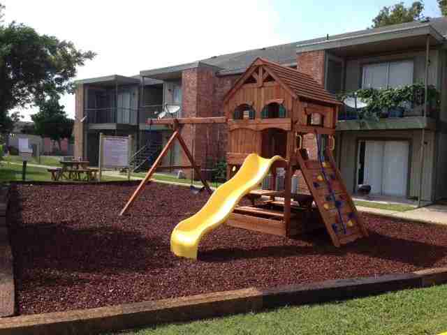 Adobe Village Apartments - Photo 2 of 7