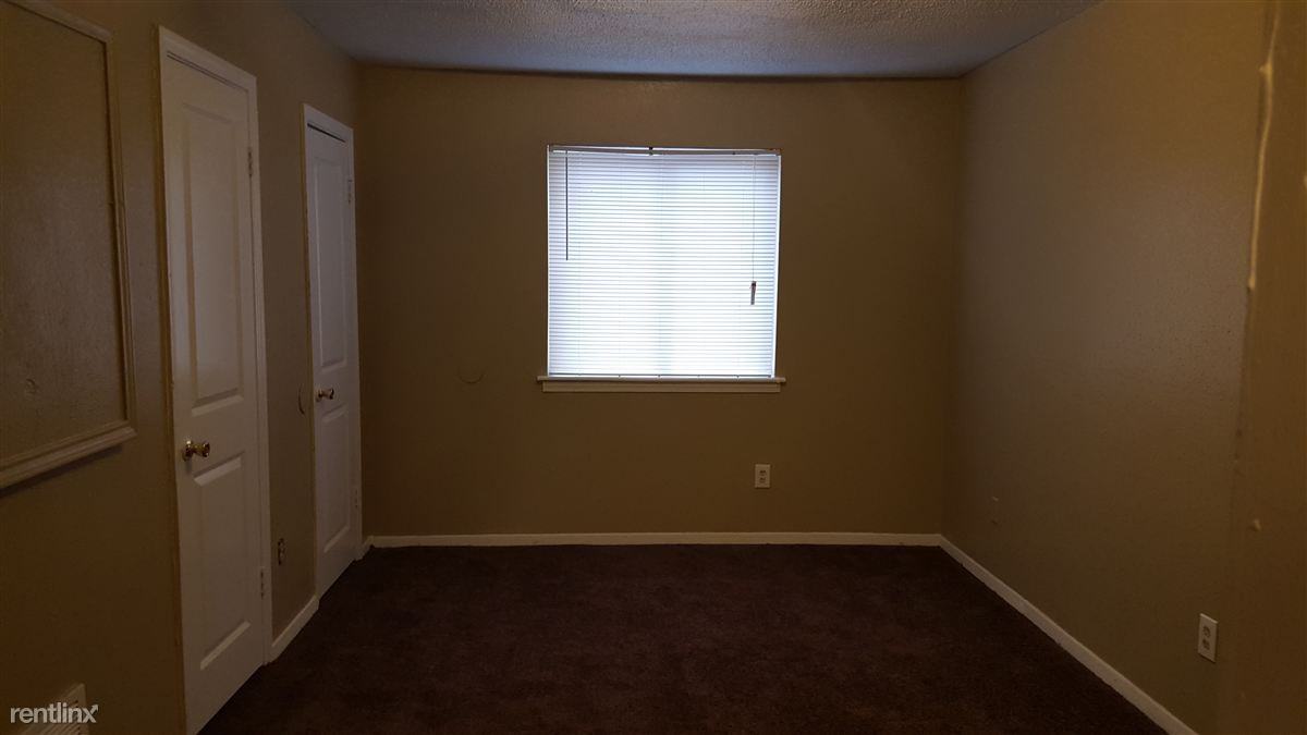 Whispering Pines Apartments - Photo 2 of 4
