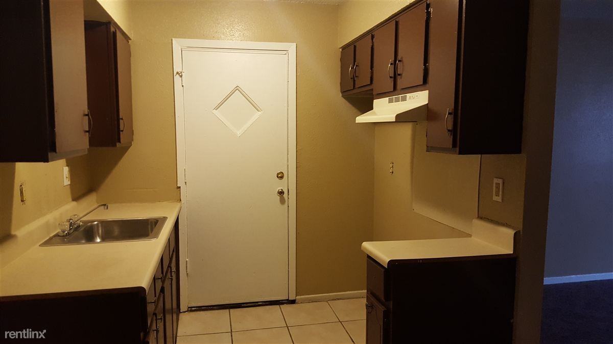 Whispering Pines Apartments - Photo 3 of 4