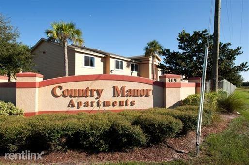 Country Manor Apartments - Photo 2 of 9