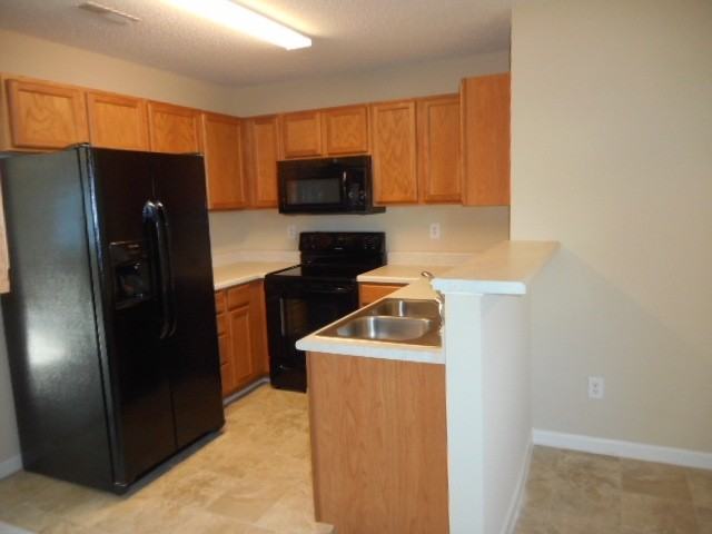 5704 Waterpoint Dr - Photo 3 of 9