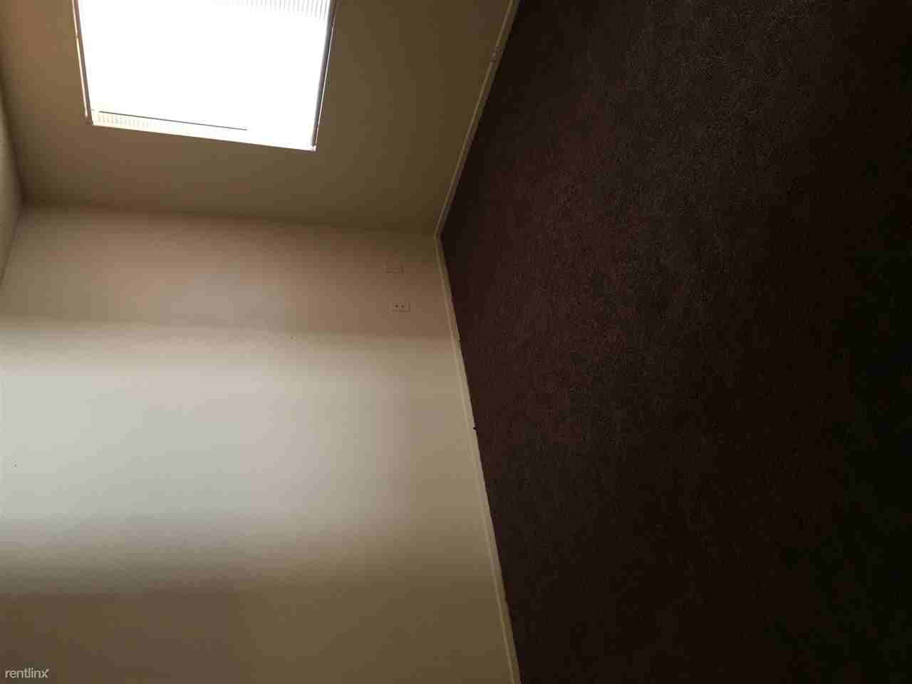 Rain Tree Apartments - Photo 2 of 4