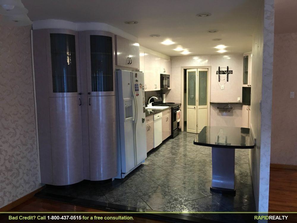 2077 E 56th St - Photo 2 of 3