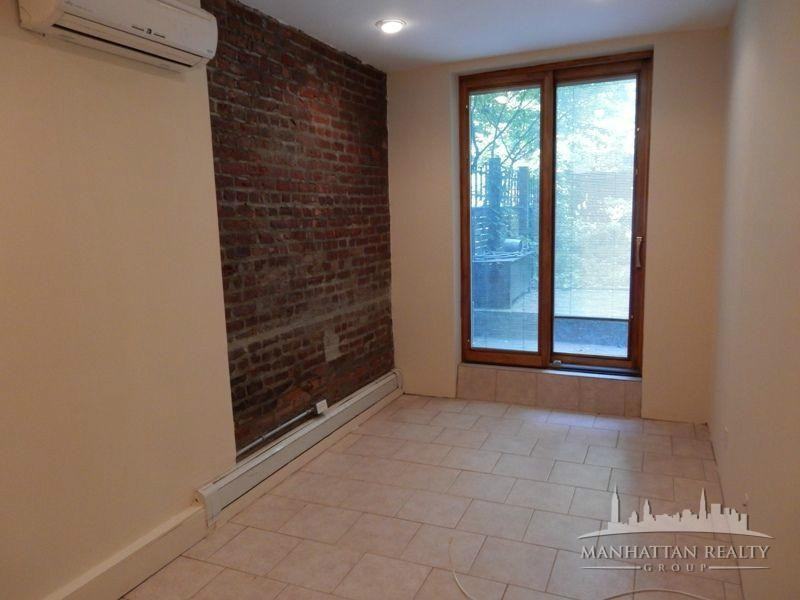 437 W 24th St 1 - Photo 3 of 7