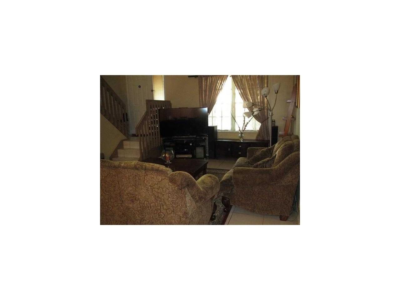 1285 NW 108th Ave - Photo 3 of 8