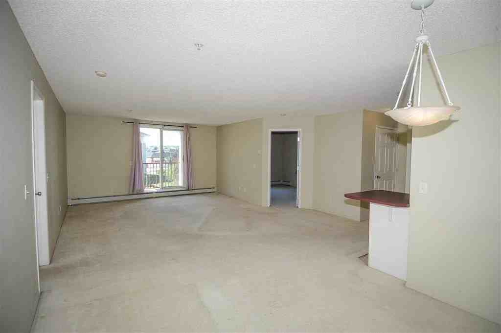 9 Country Village Bay NE #209 - Photo 2 of 25