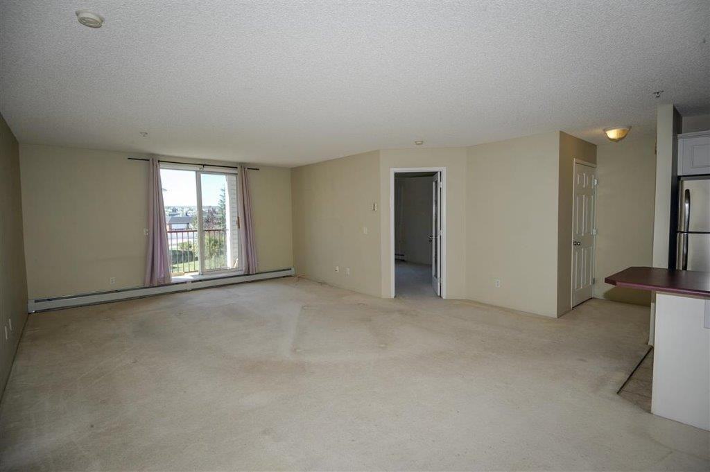 9 Country Village Bay NE #209 - Photo 3 of 25