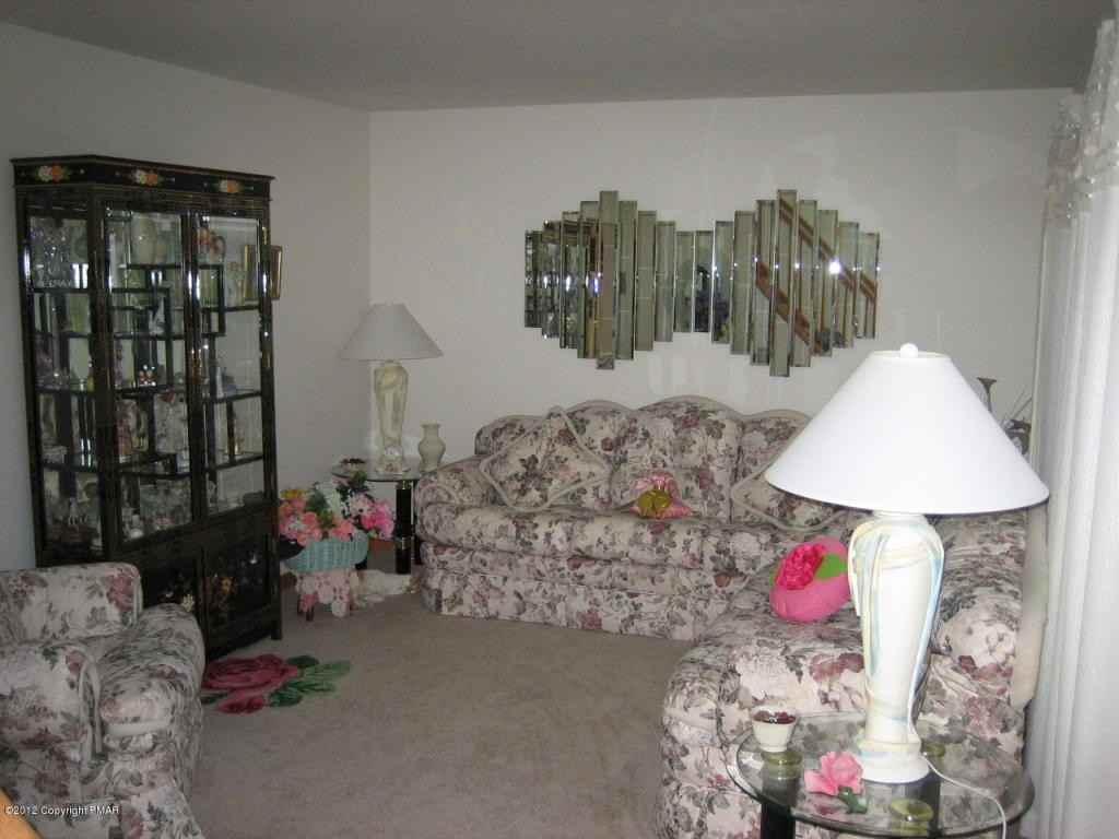 555 Whipporwill Dr - Photo 3 of 18
