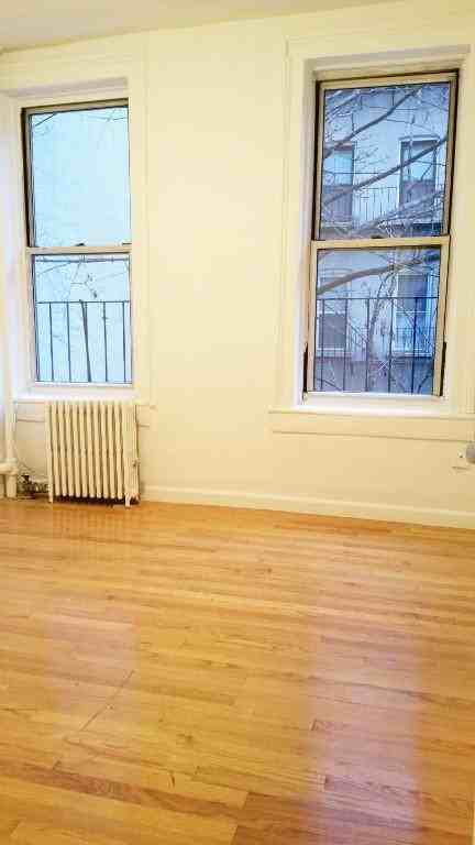 E 61st St #9 - Photo 2 of 3