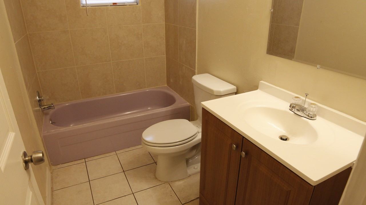 1403 Amos Ave - Photo 2 of 4