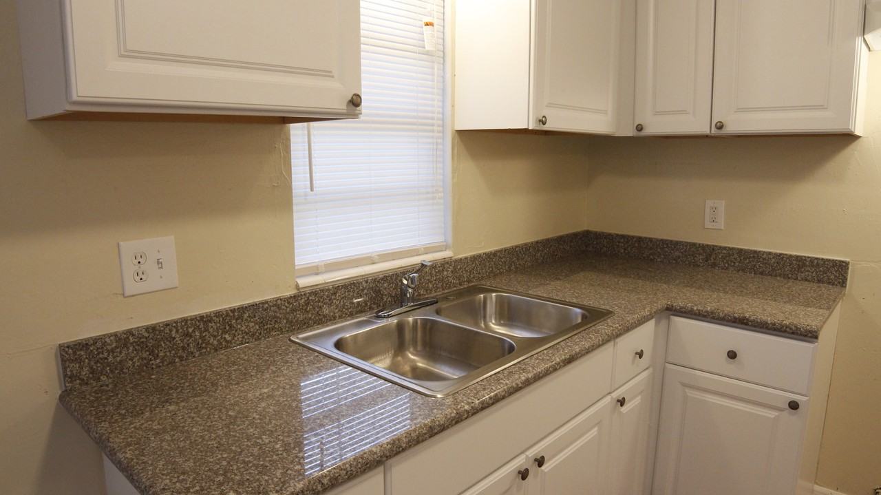 1403 Amos Ave - Photo 3 of 4