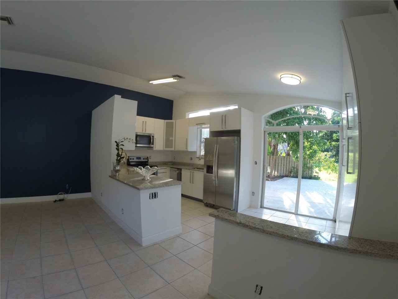 6071 NW 40th St - Photo 3 of 7