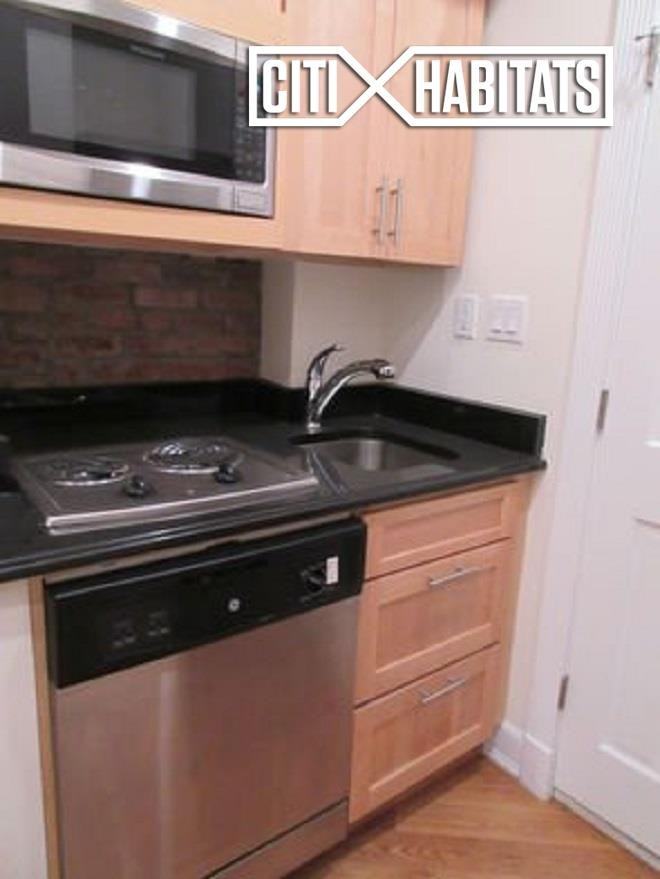 E 10th St #16 - Photo 3 of 5