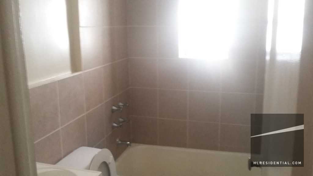 22-34 92nd St 1 - Photo 2 of 5