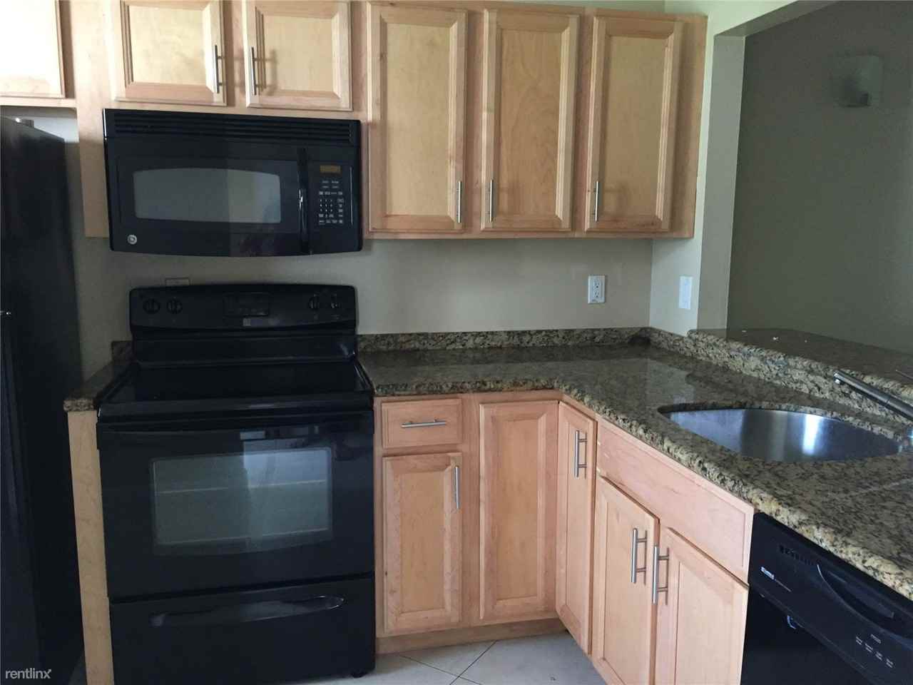 851 NE 209th Terrace - Photo 3 of 4