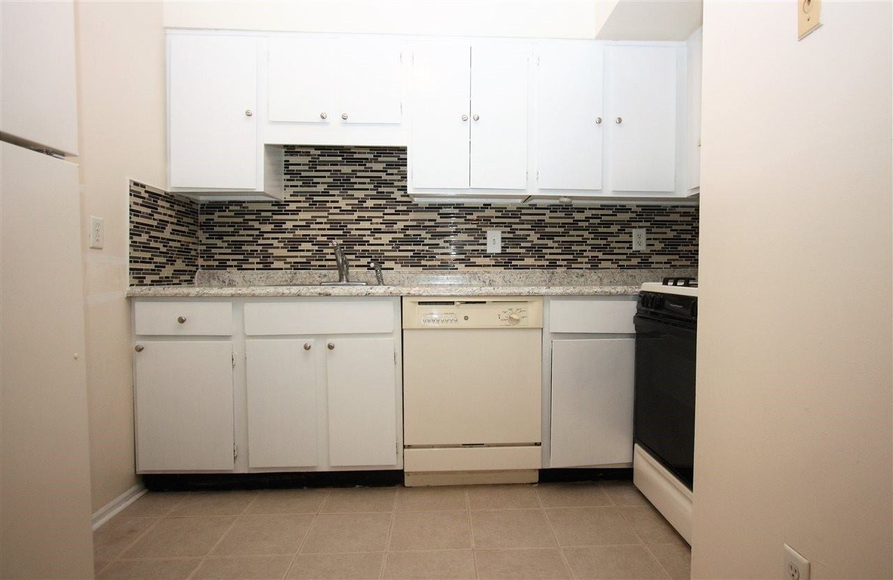 228 Christopher Columbus Dr #1 - Photo 3 of 8