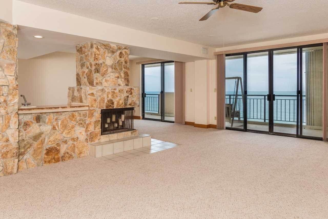 7415 Aquarina Beach Dr - Photo 2 of 20