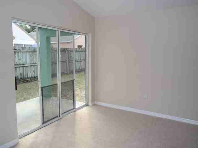 16245 Coopers Hawk Ave - Photo 3 of 9