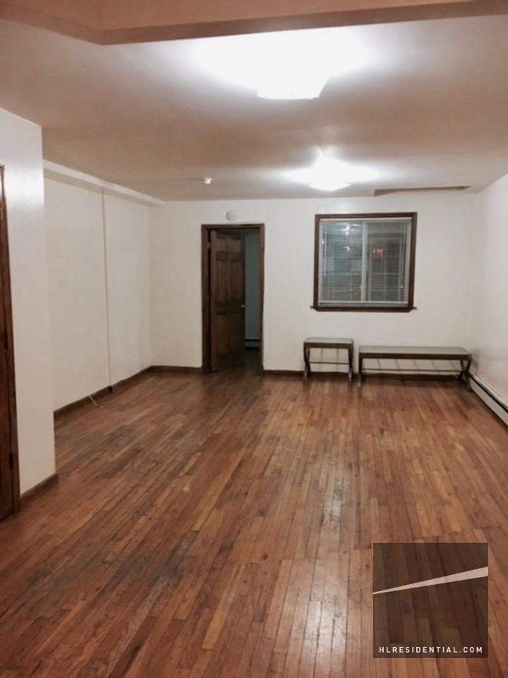 70-01 67th Pl 1 - Photo 3 of 14