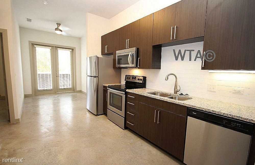1201 Lady Bird Ln - Photo 2 of 10