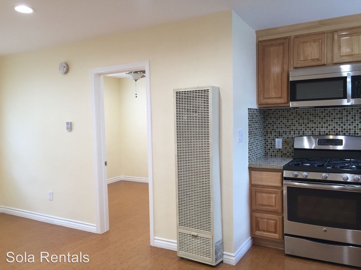 15412 Atlantic Ave - Photo 3 of 8