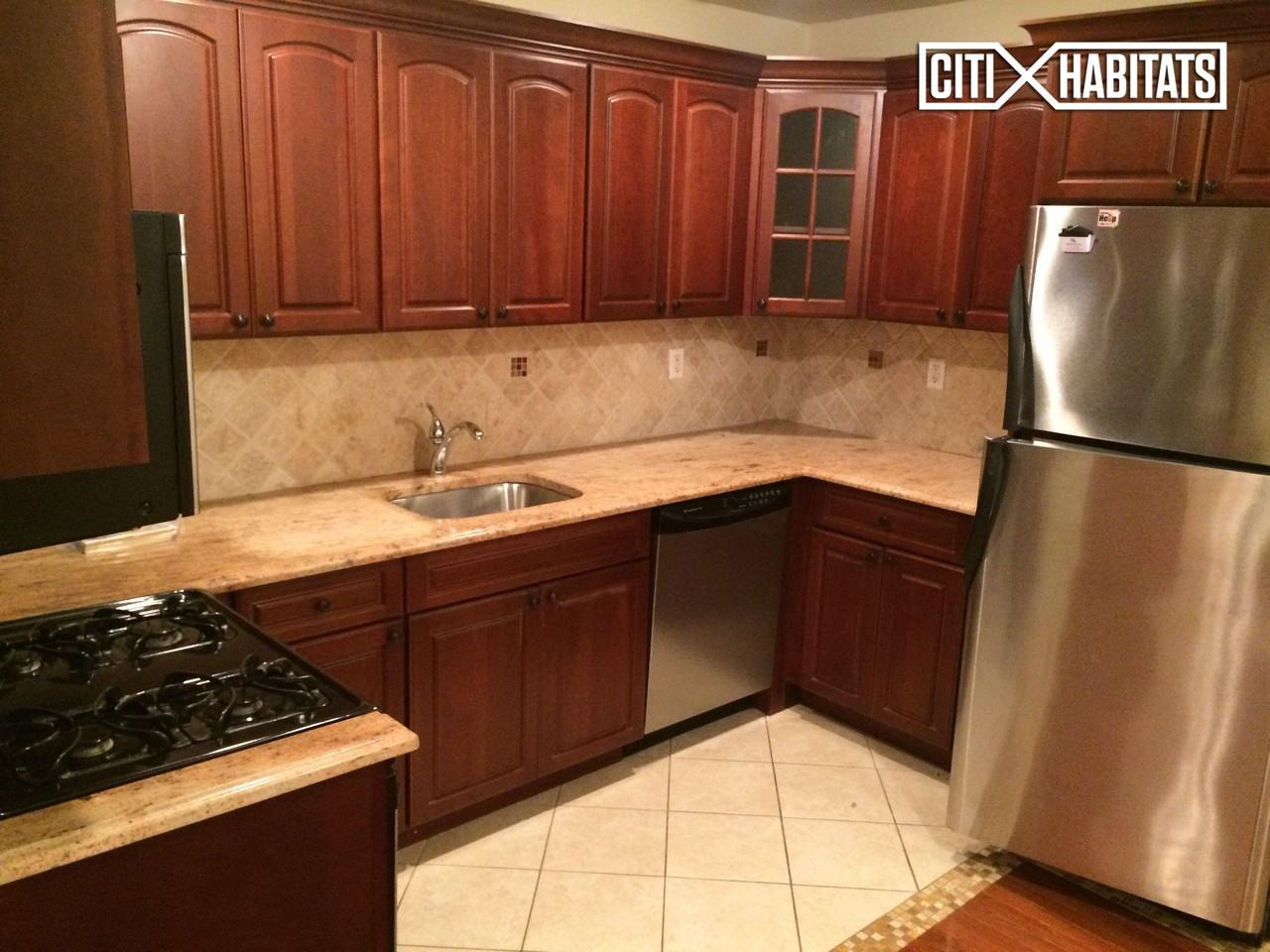 60-28 60th Pl 1FL - Photo 2 of 6
