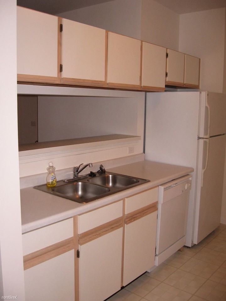 Randall Village Condominiums - Photo 2 of 6