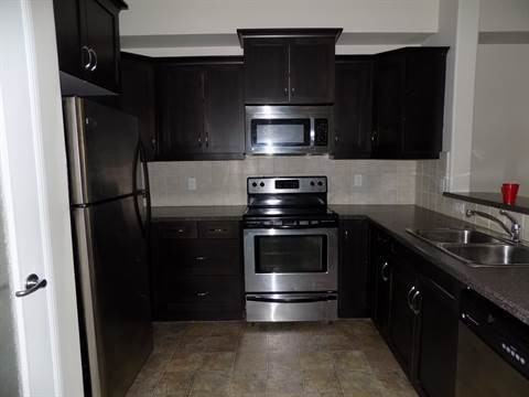 12408 15 Ave SW #104 - Photo 2 of 9