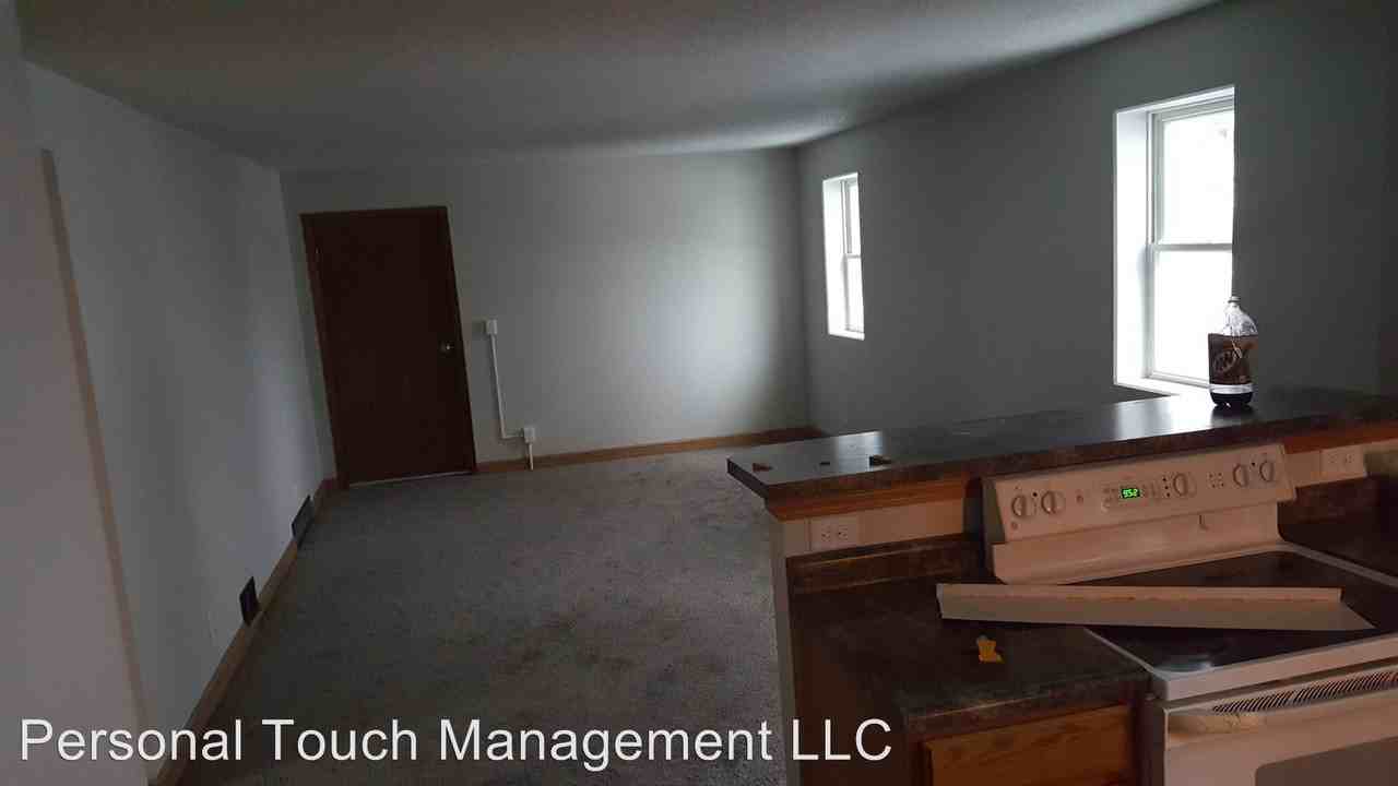 303 Center Ave E - Photo 2 of 7