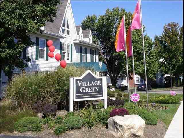 Village Green Apartments - Photo 2 of 13