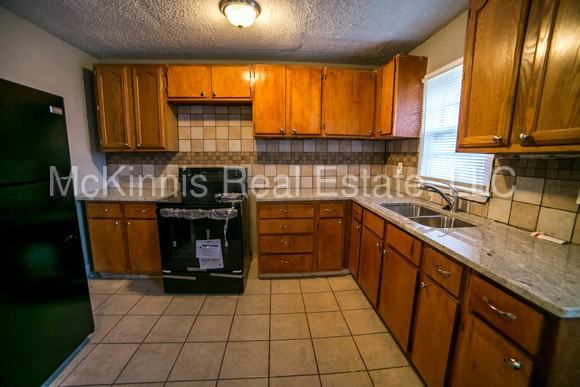 9810 Marsh Ave - Photo 3 of 7