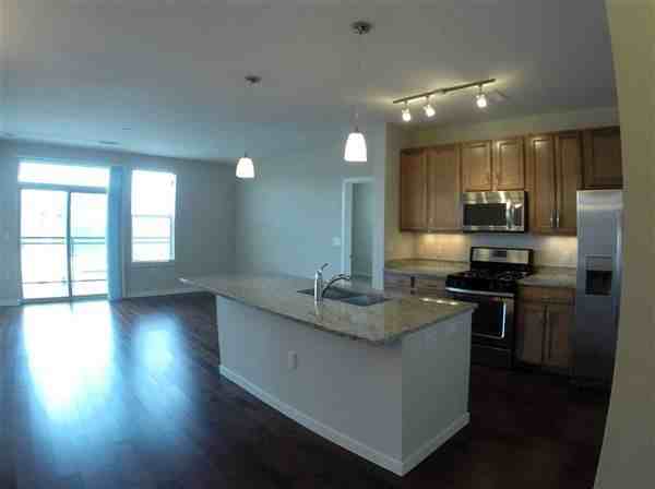 East Village Flats at Vantage Pointe - Photo 2 of 8