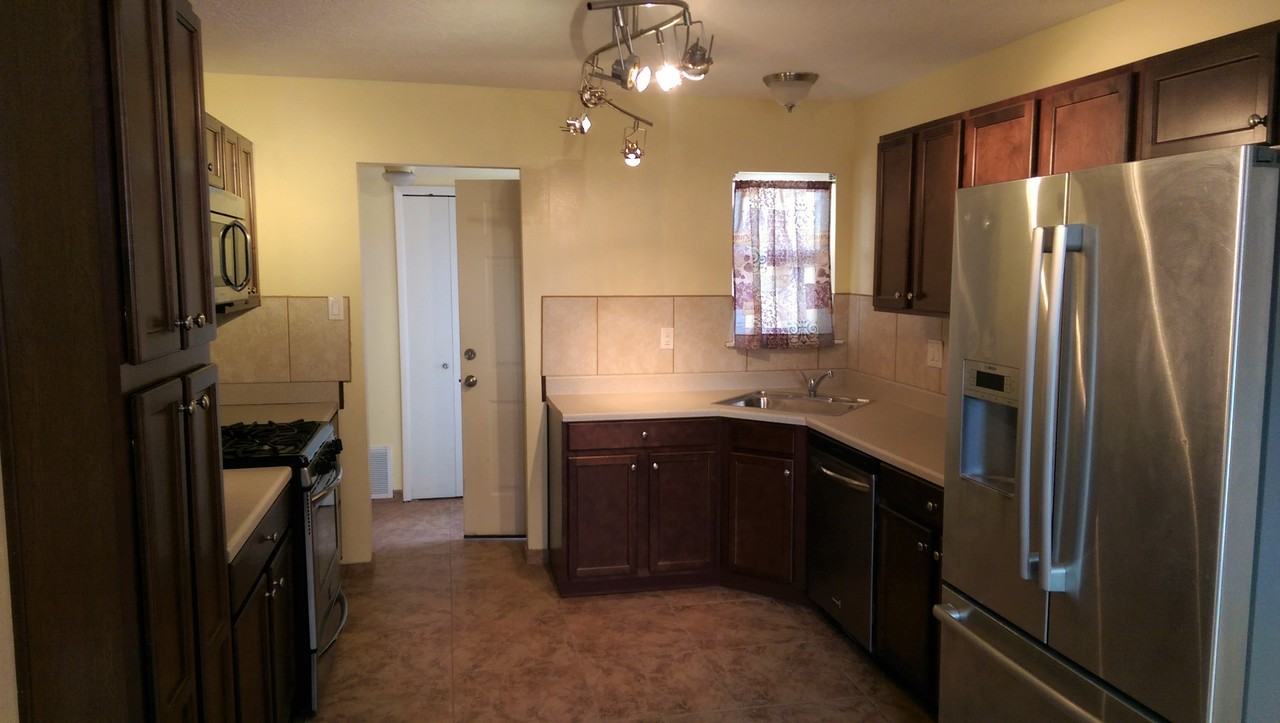 11613 Palm Springs Ave NE - Photo 3 of 16