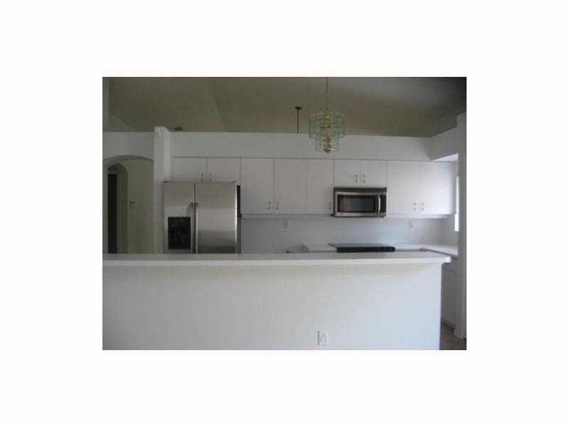 1052 NW 124th Terrace - Photo 3 of 6