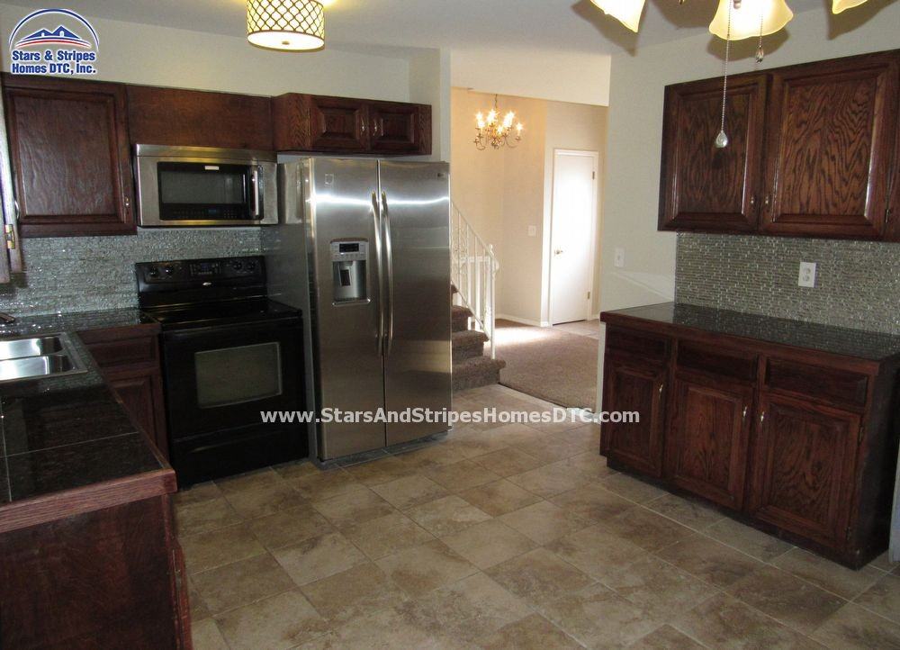 7055 W Fremont Pl - Photo 3 of 26