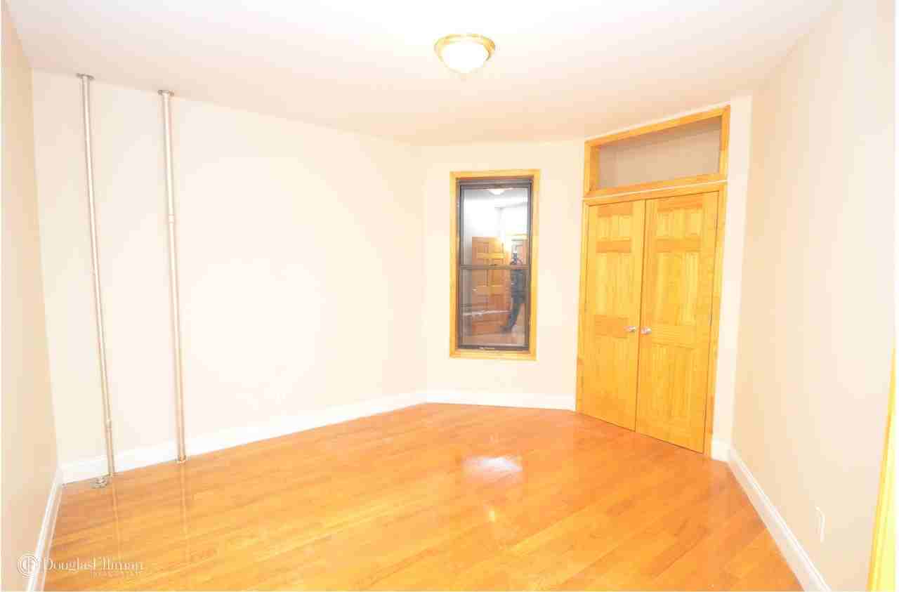 477-467 Malcolm X Blvd 3 - Photo 2 of 6